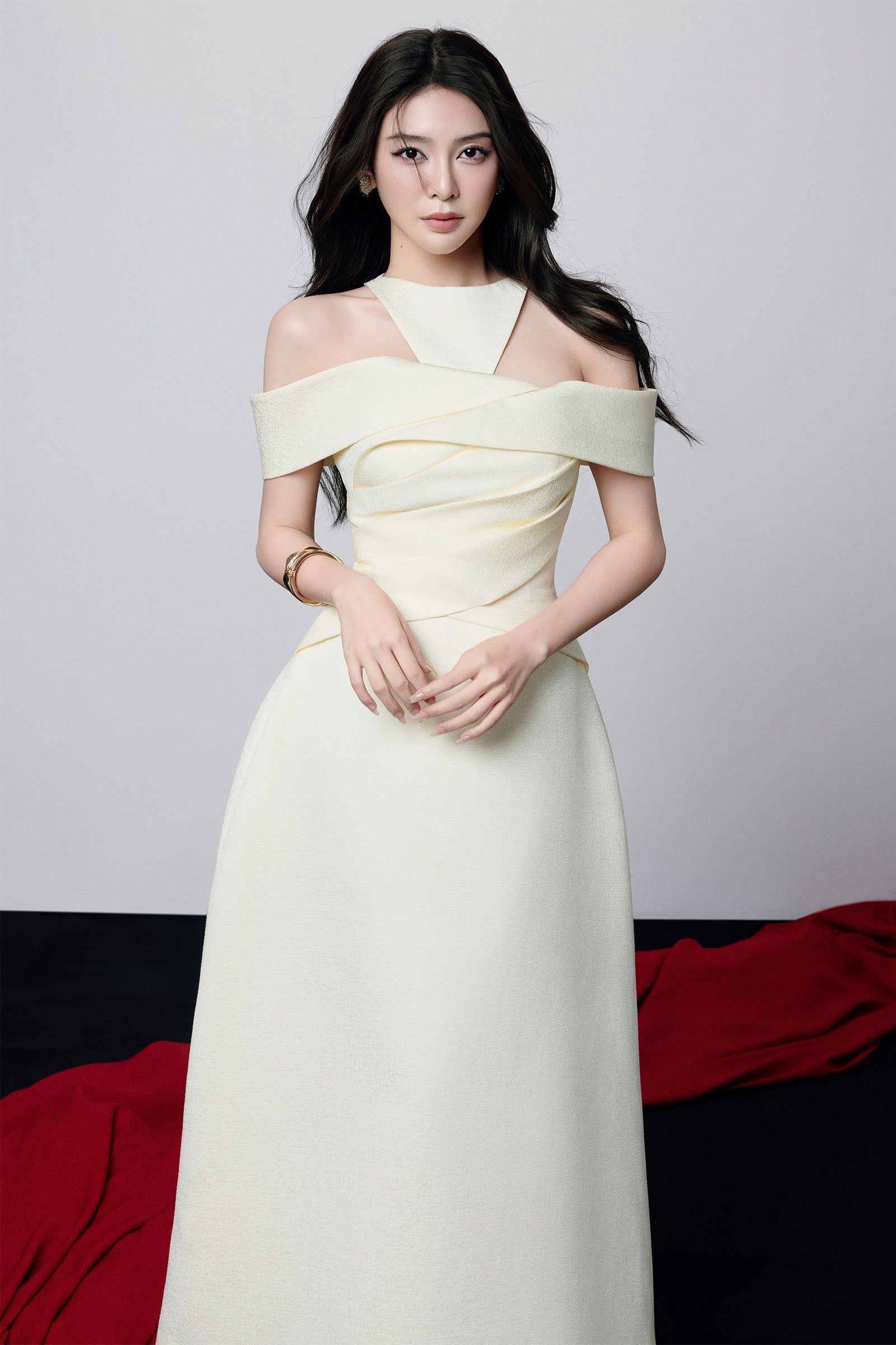 Aaliyah Off-Shoulder Draped Halter Midi Dress in Apricot Avalabel