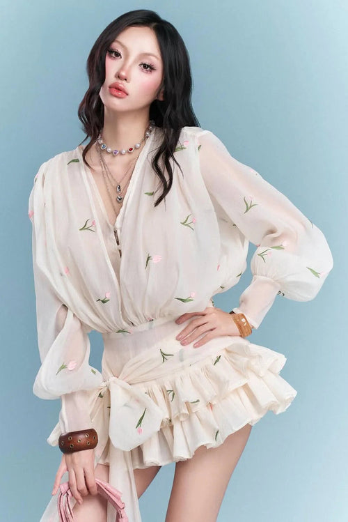 Amelia Embroidered Floral V-neck Ruffle Mini Dress in Apricot Avalabel