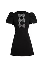 Vanessa Bow Puff Sleeve Mini Dress in Black Avalabel