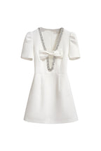 V-Neck Diamond Chain Bow Mini Dress in Ivory Avalabel
