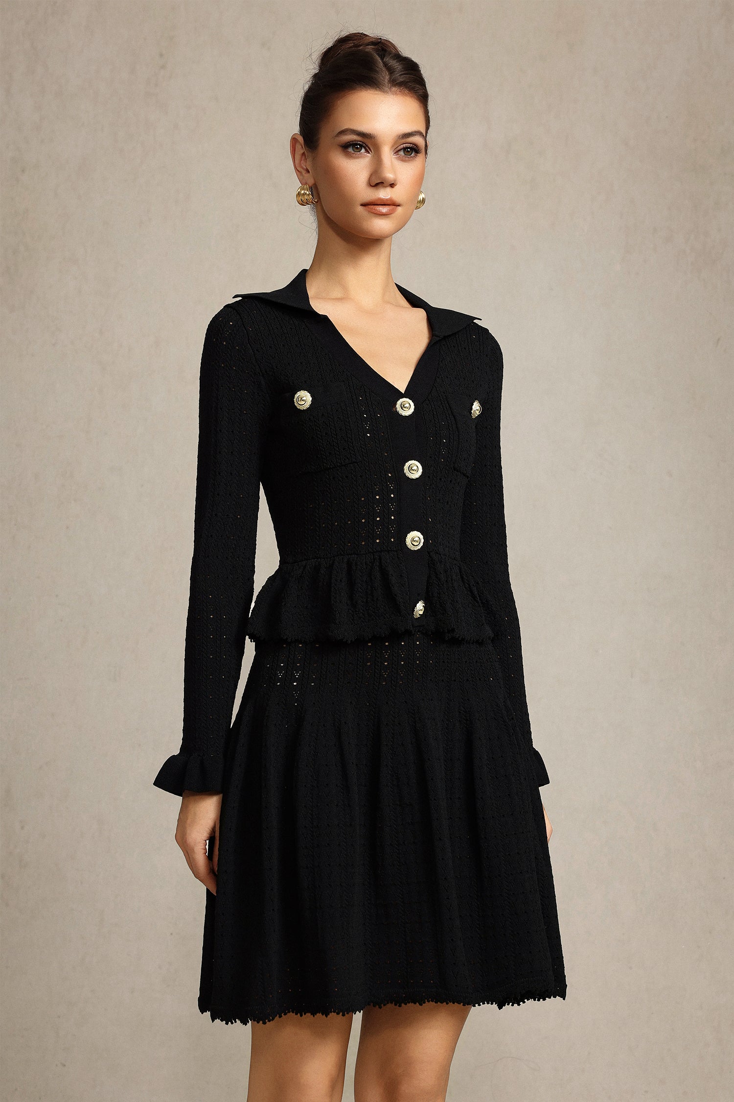 Leaf-edge paneled V-neck knitted mini dress in black Avalabel
