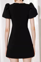 Vanessa Bow Puff Sleeve Mini Dress in Black Avalabel