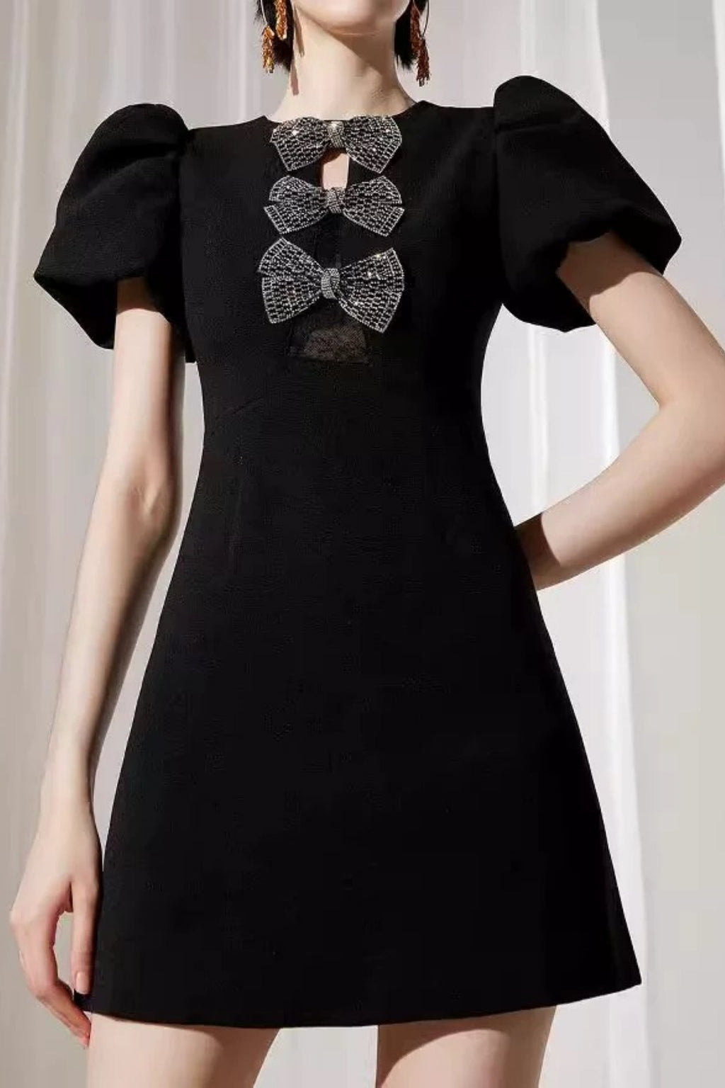 Vanessa Bow Puff Sleeve Mini Dress in Black Avalabel