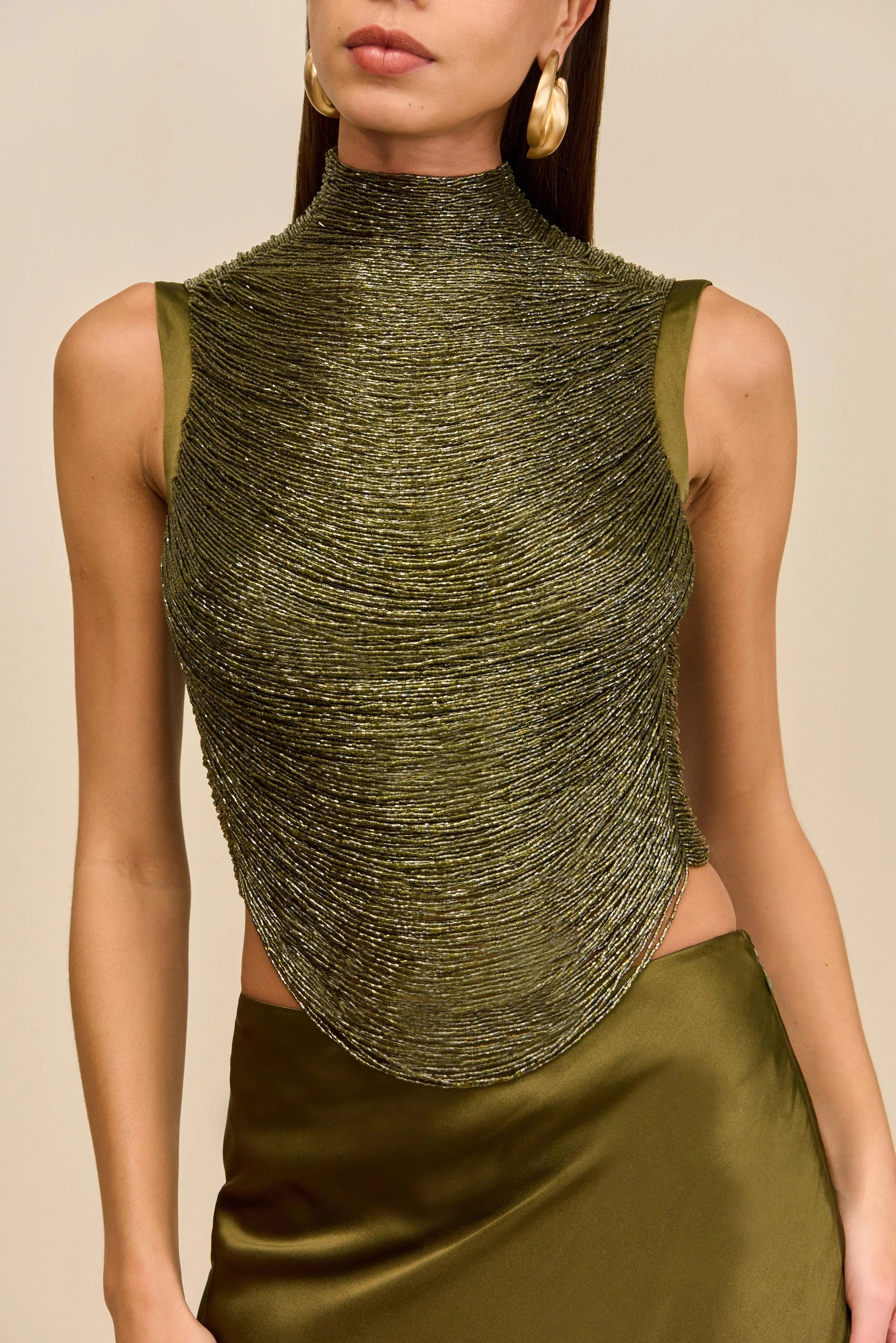 Sleeveless Turtleneck Tassel Paneled Top and Satin Skirt Set in green Avalabel