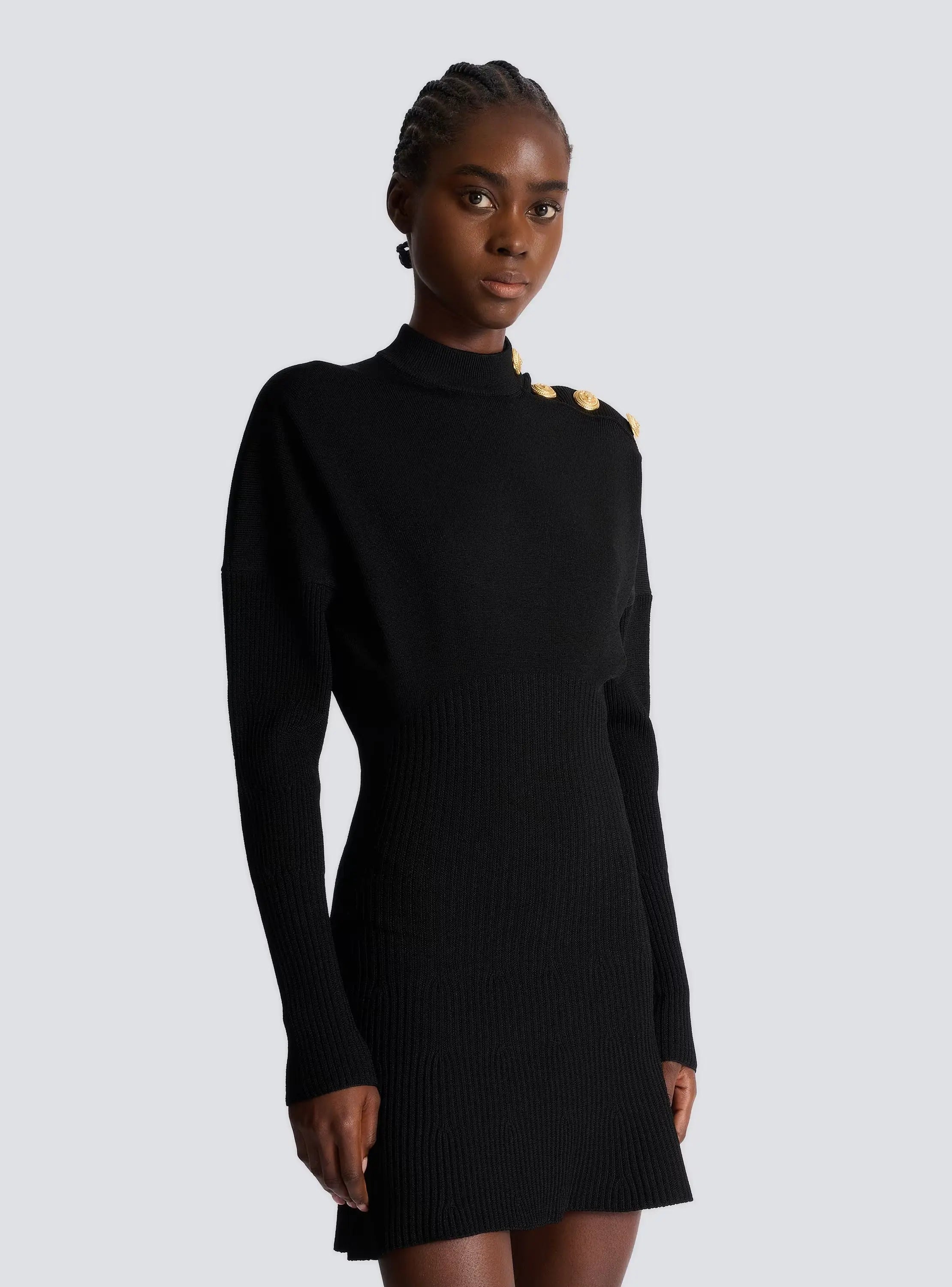 Roberta Long Sleeve Flared Knit Mini Dress in Black Avalabel