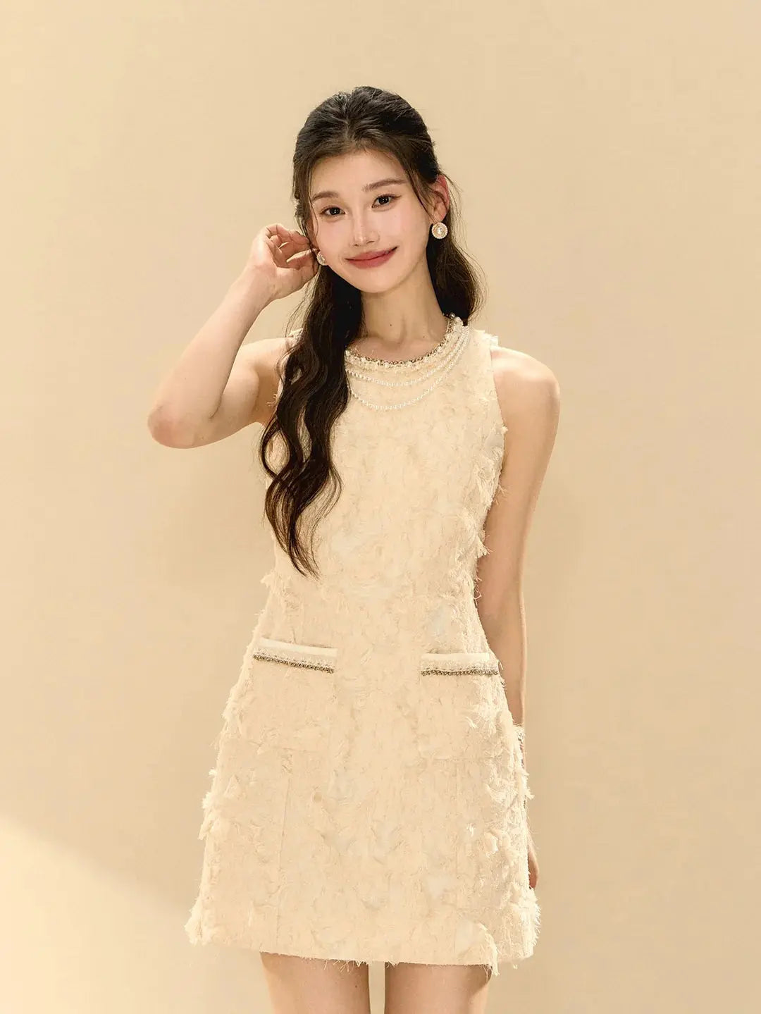 pandora Feathery Sleeveless A-line mini Dress in beige Avalabel