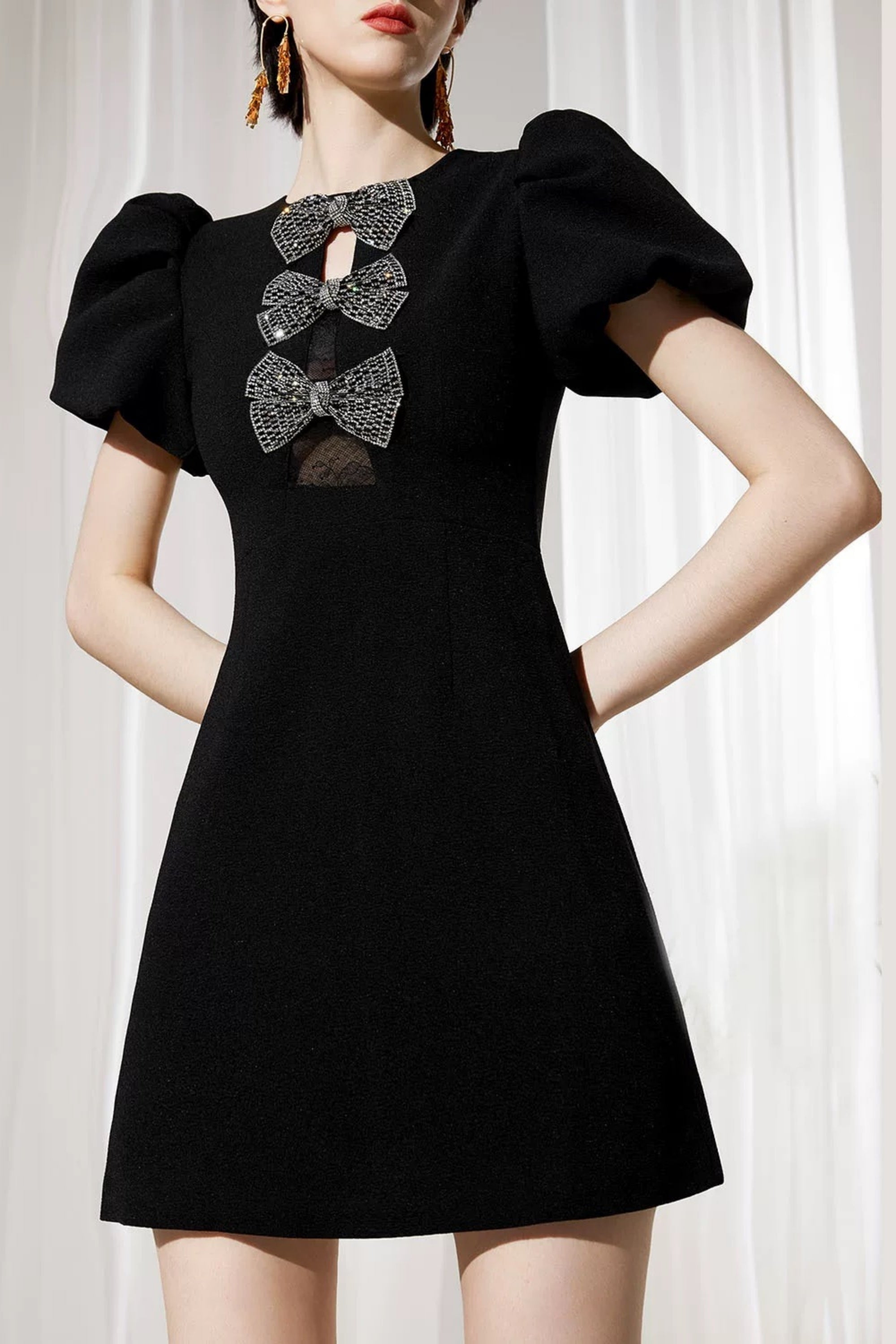 Vanessa Bow Puff Sleeve Mini Dress in Black Avalabel