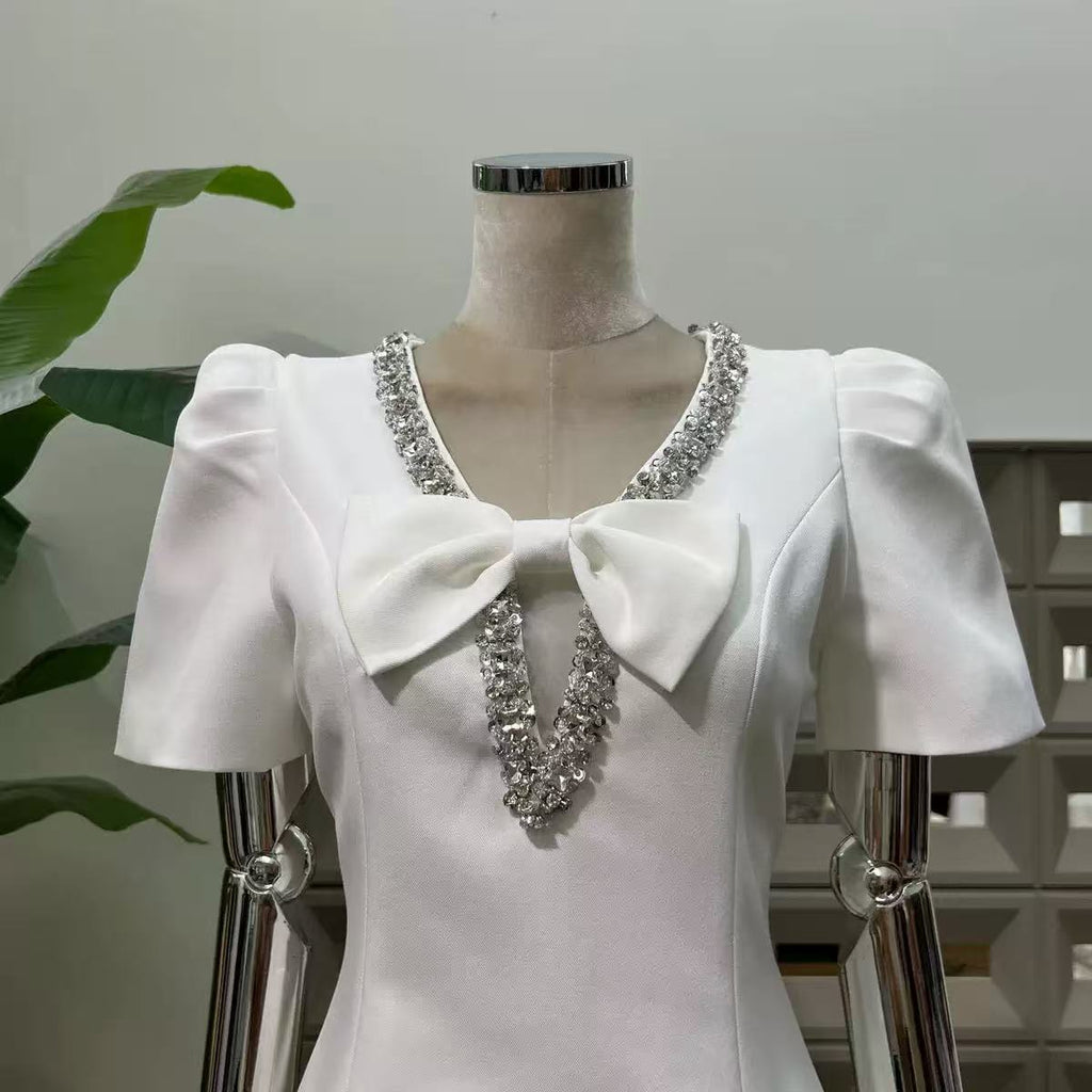 V-Neck Diamond Chain Bow Mini Dress in Ivory Avalabel