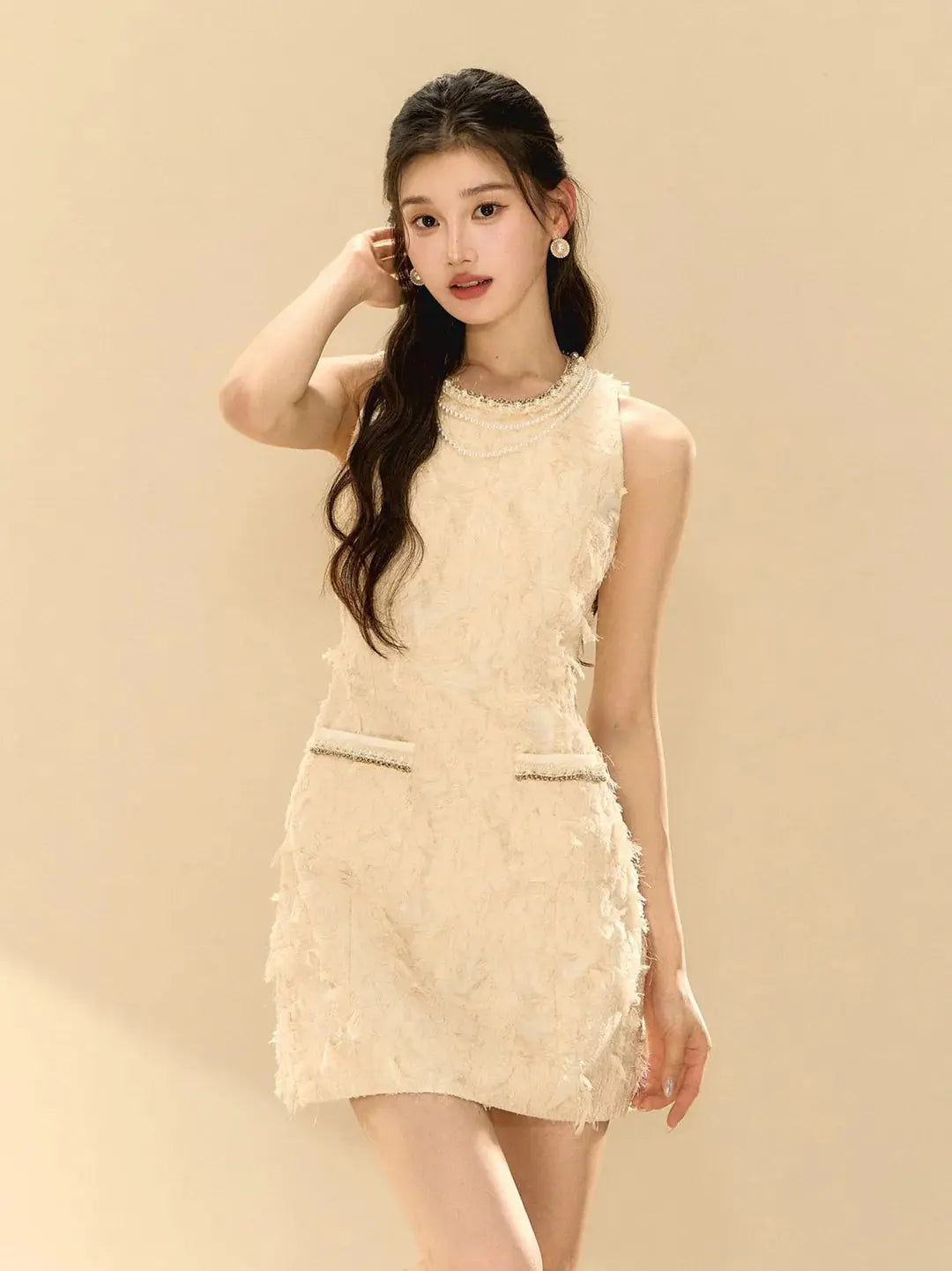 pandora Feathery Sleeveless A-line mini Dress in beige Avalabel