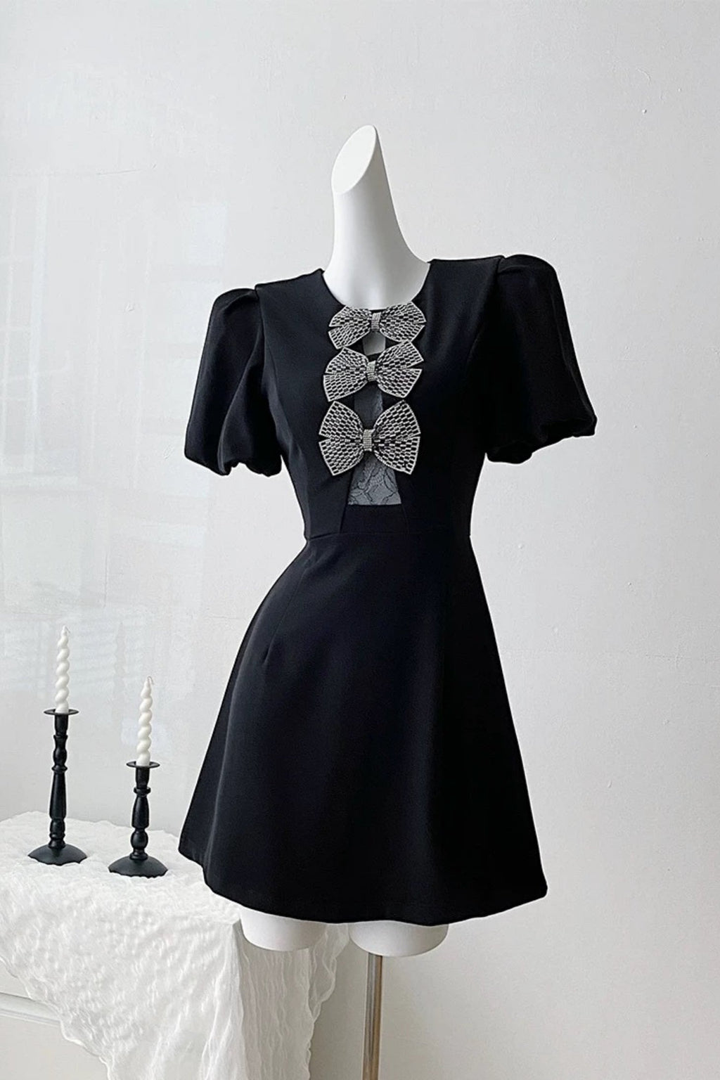 Vanessa Bow Puff Sleeve Mini Dress in Black Avalabel
