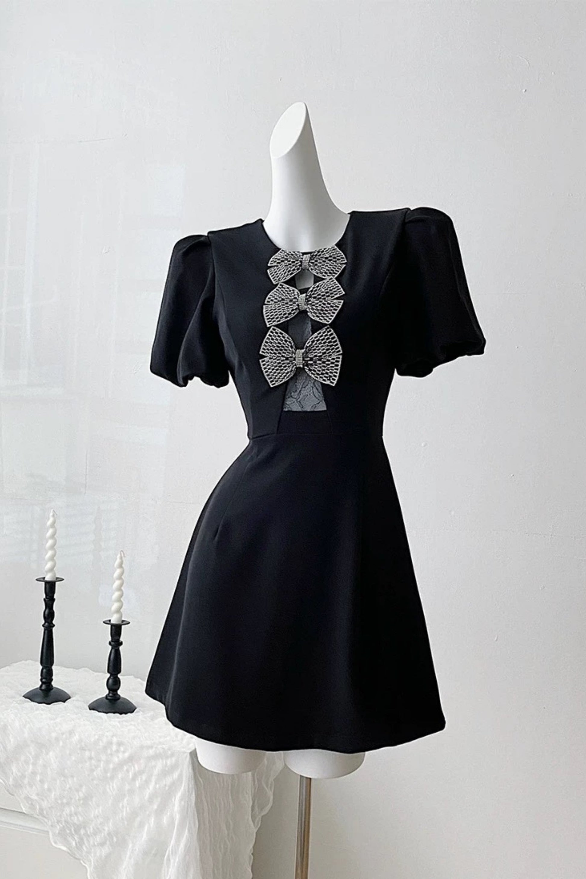 Vanessa Bow Puff Sleeve Mini Dress in Black Avalabel
