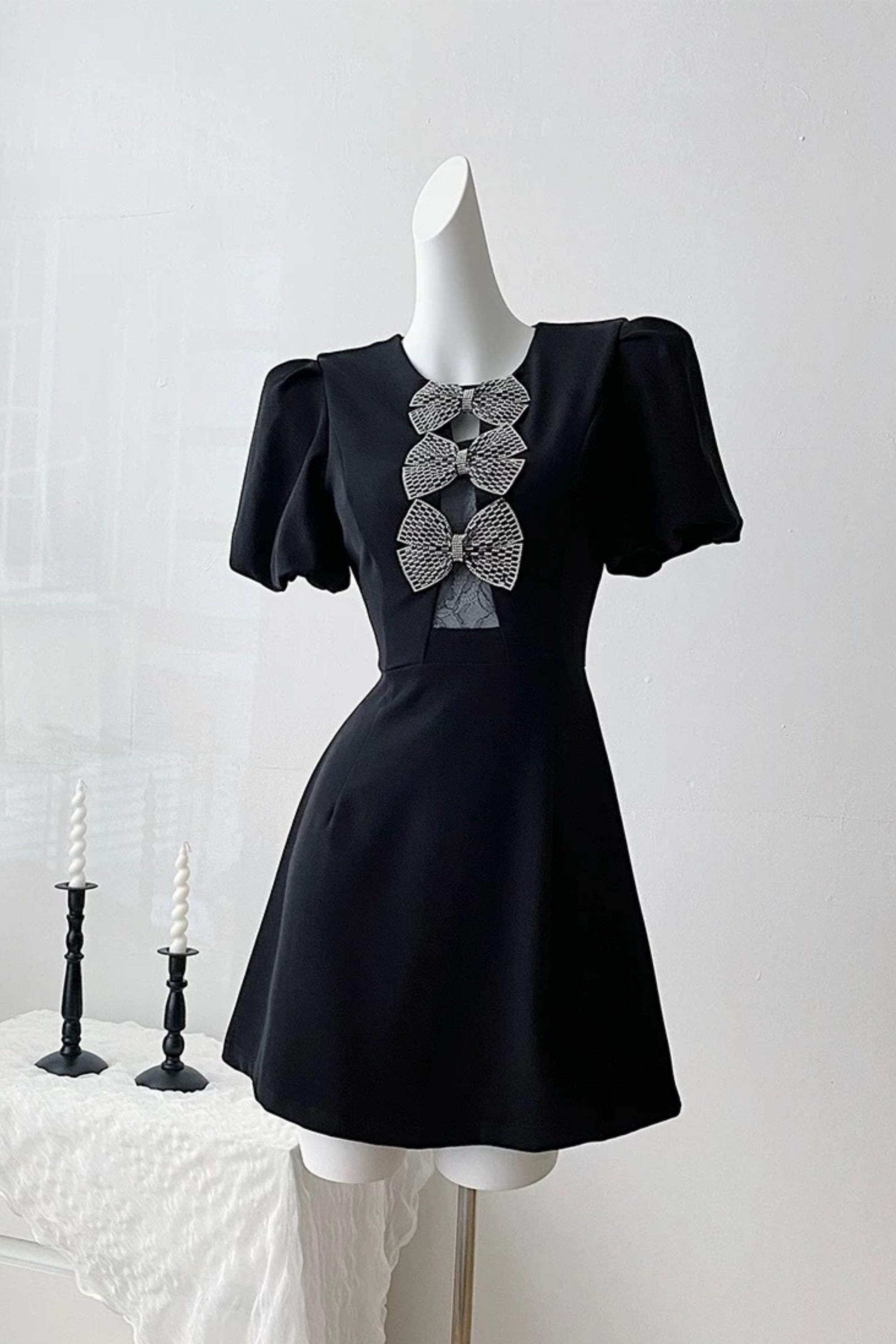 Vanessa Bow Puff Sleeve Mini Dress in Black Avalabel