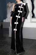 victoria Bow Cascade Velvet Maxi Dress in black Avalabel