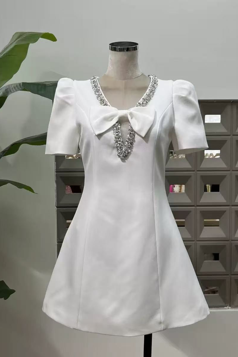 V-Neck Diamond Chain Bow Mini Dress in Ivory Avalabel