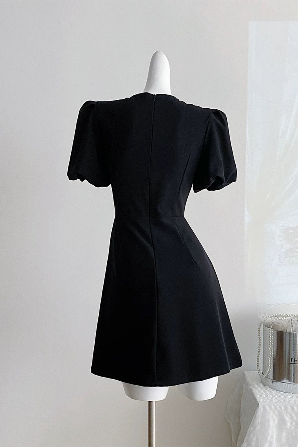 Vanessa Bow Puff Sleeve Mini Dress in Black Avalabel