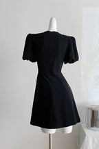 Vanessa Bow Puff Sleeve Mini Dress in Black Avalabel
