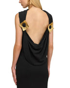 black sleeveless backless knit midi dress with two pleated golden embellishments Avalabel