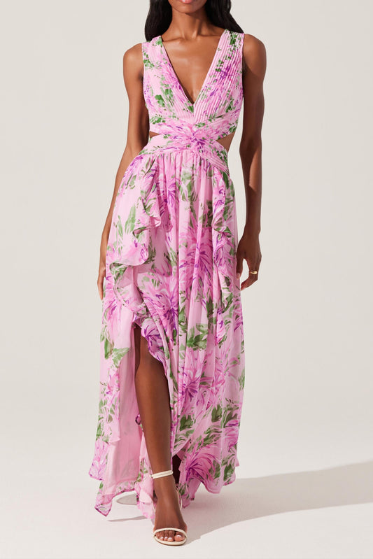 Woman wearing a pink floral dress on a white background