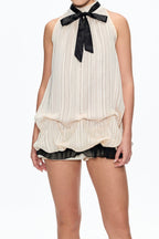 eudora Sleeveless Bow Top in beige Avalabel
