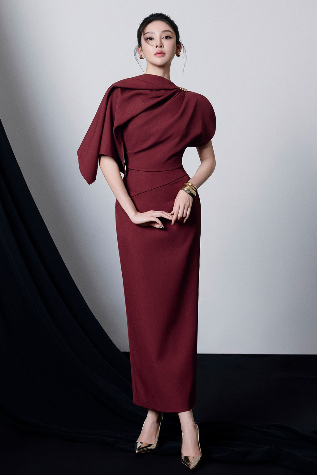 Genevieve Asymmetric Sleeve Draped Midi Dress in Burgundy Avalabel