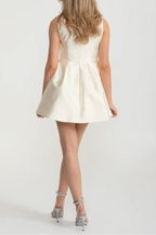 Elegant Fitted Dress With Pearl-Embellished Round Neckline And Bow Waistline Accent - Ivoire Avalabel