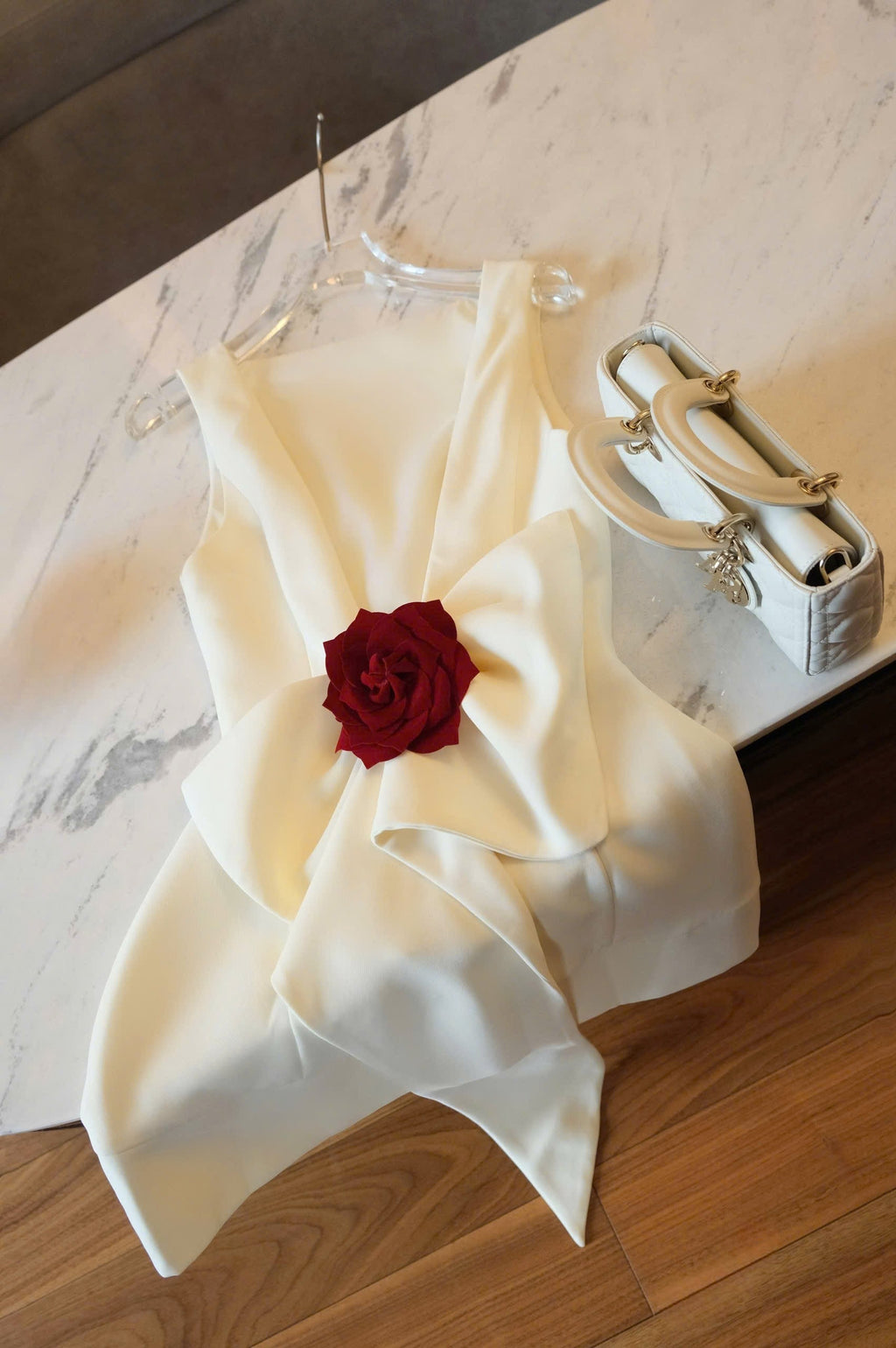 Joanna backless flower bow embellished mini dress in white Avalabel
