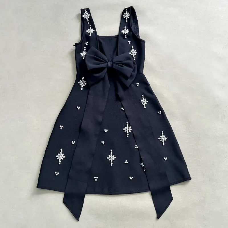 adora Sleeveless Diamond Bow Bandage Mini Dress in black Avalabel