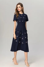 katherine 3d flower appliqué midi dress in navy blue Avalabel