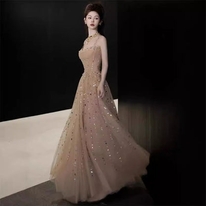 Nicola's Elegant Backless Halter Maxi Dress - Champagne
