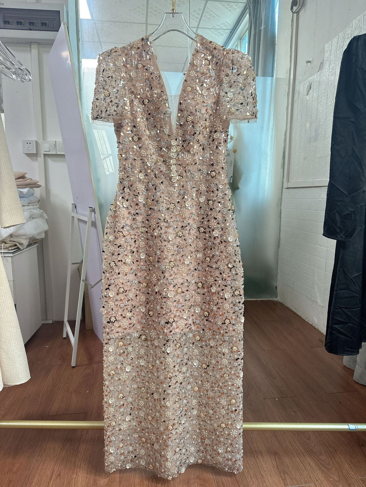 Embroidery v -neck midi dress in beige Avalabel