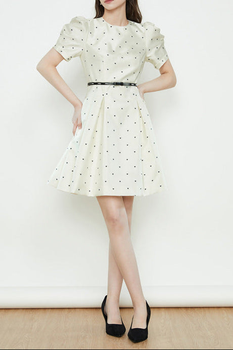 Elsie Polka Dot Puff Sleeve mini dress in beige Avalabel