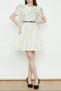Elsie Polka Dot Puff Sleeve mini dress in beige Avalabel
