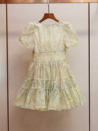 Printed V-neck tutu mini dress in Daisy Yellow Avalabel