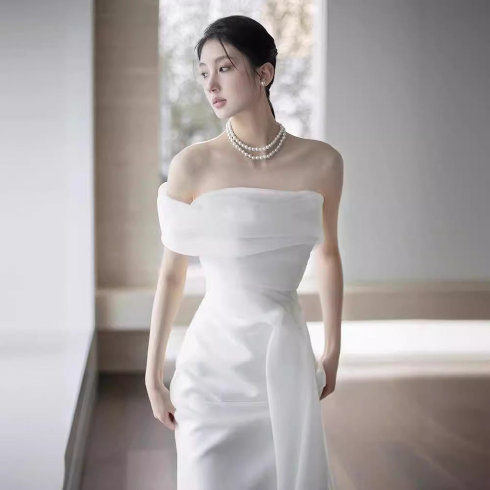 Lisa in a Simple Yet Elegant White French-Style one-Shoulder Mermaid Maxi Dress Avalabel