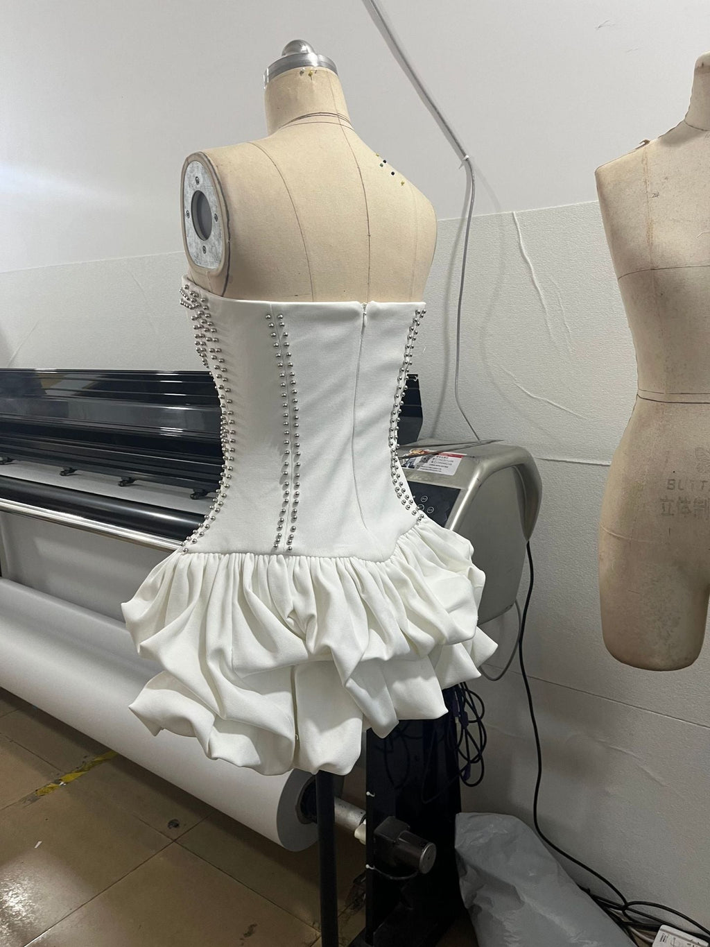 regina strapless puffy mini dress in off-white Avalabel