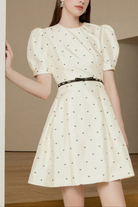 Elsie Polka Dot Puff Sleeve mini dress in beige Avalabel