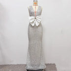 rebecca bow sequin embellished v neck maxi dress in silver Avalabel