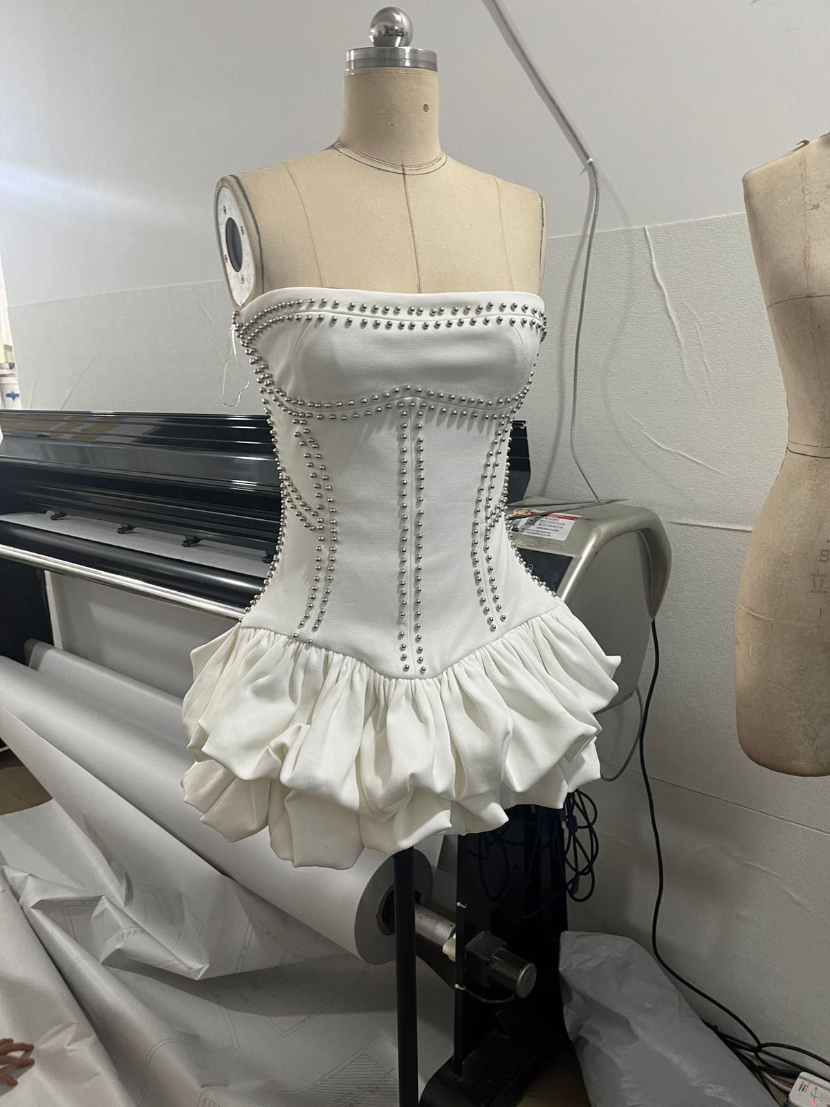 regina strapless puffy mini dress in off-white Avalabel