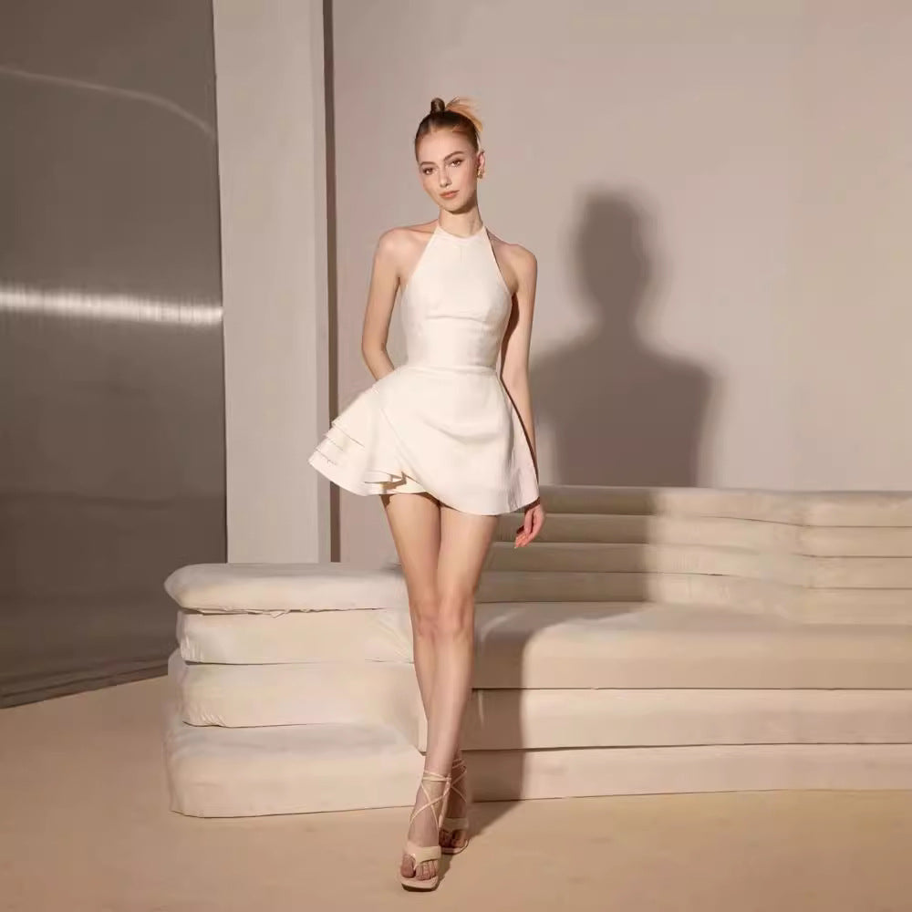 Elsa Pleated Backless Halter Mini Dress in Beige Avalabel