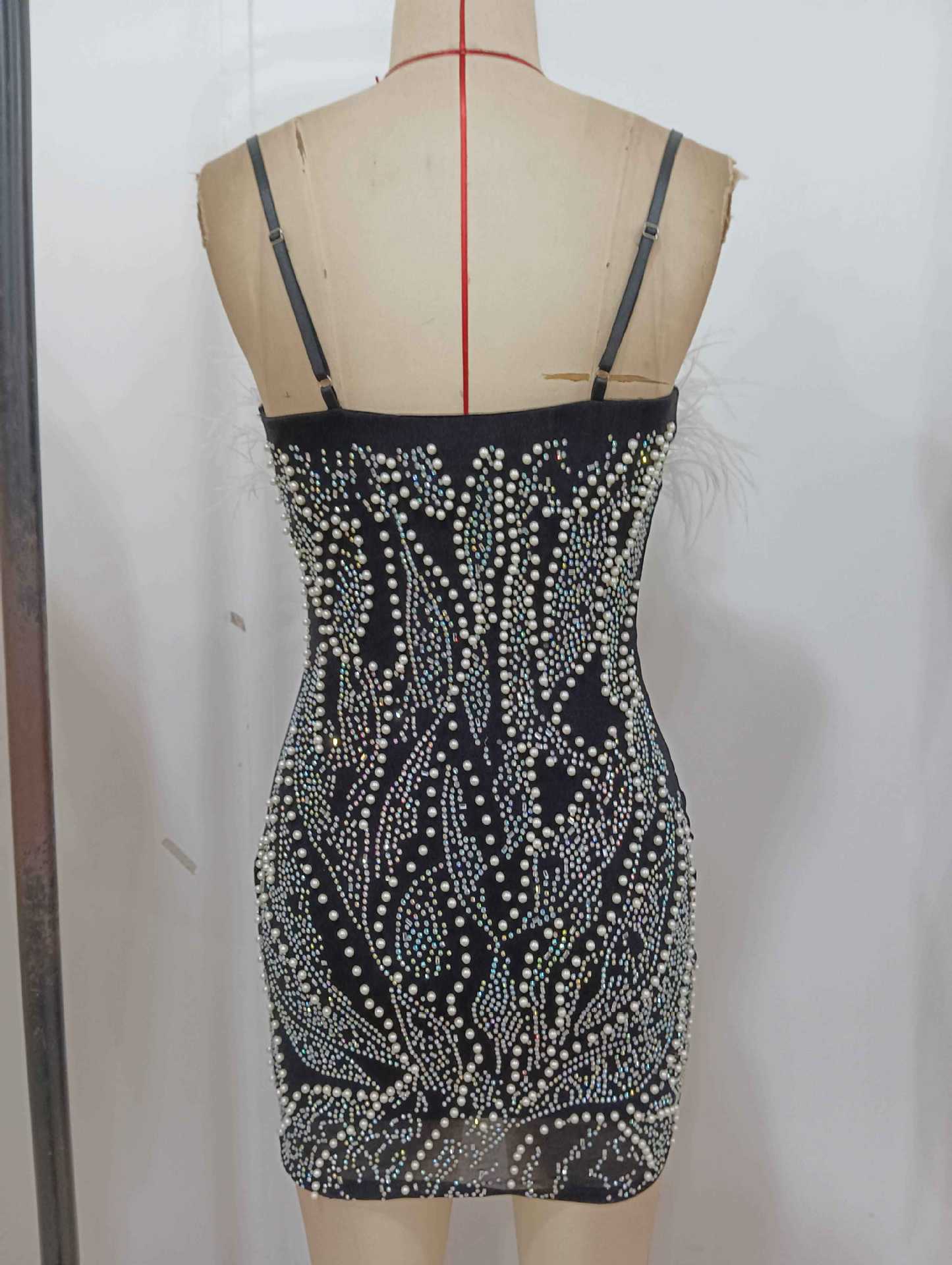 zenobia Pearl-embellished deep V-neck backless mini dress