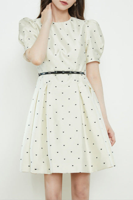 Elsie Polka Dot Puff Sleeve mini dress in beige Avalabel