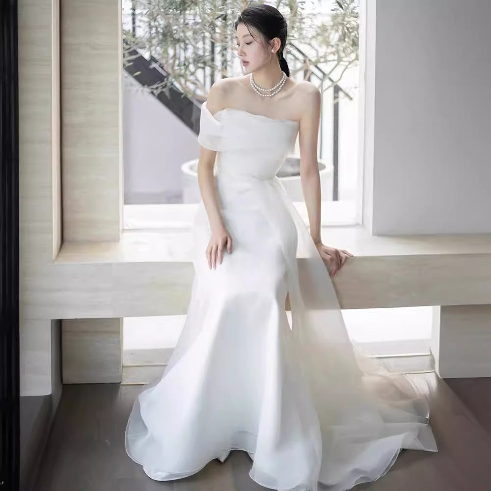 Lisa in a Simple Yet Elegant White French-Style one-Shoulder Mermaid Maxi Dress Avalabel