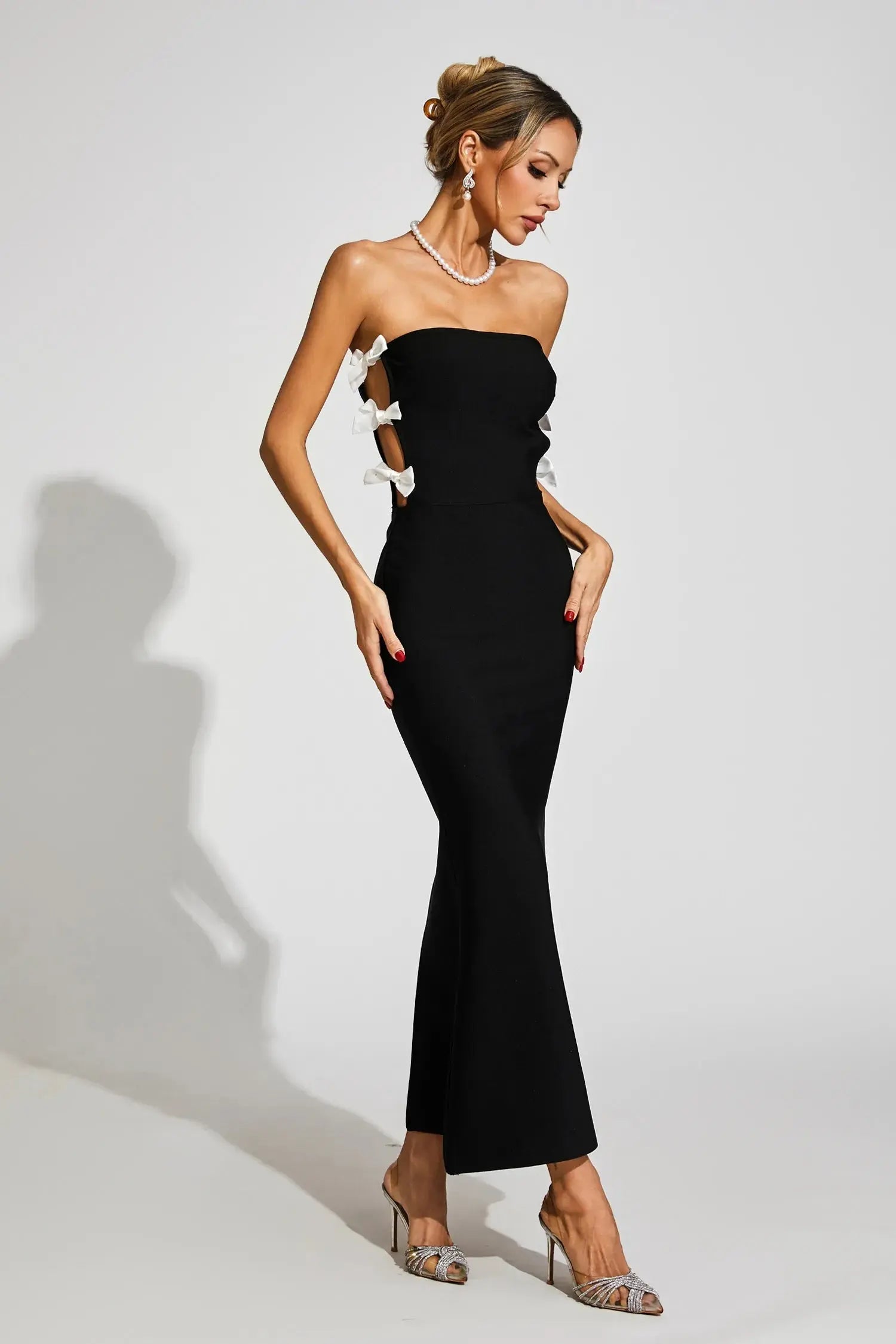 Jocelyn Bowknot-Side Bandage Strapless Maxi Dress in Black Avalabel