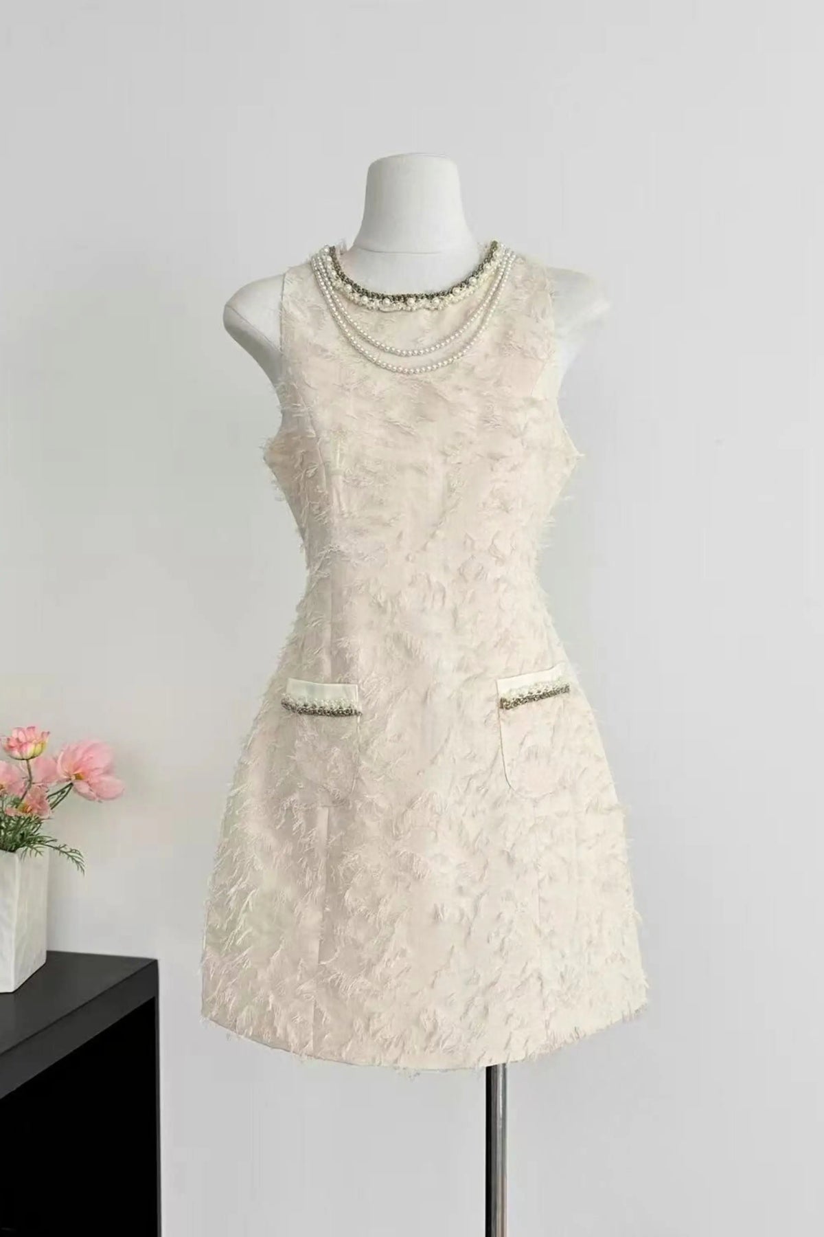 pandora Feathery Sleeveless A-line mini Dress in beige Avalabel