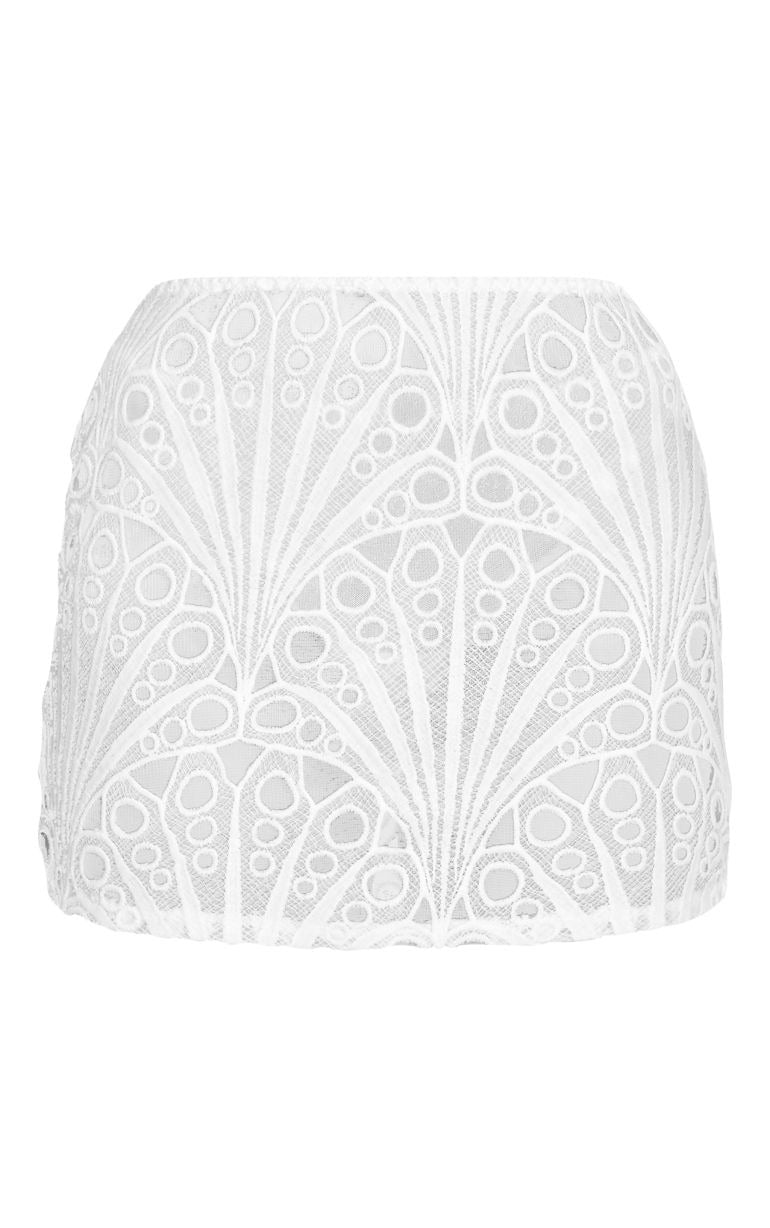White lace bandeau top with intricate pattern 