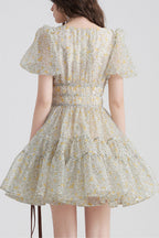 Printed V-neck tutu mini dress in Daisy Yellow Avalabel