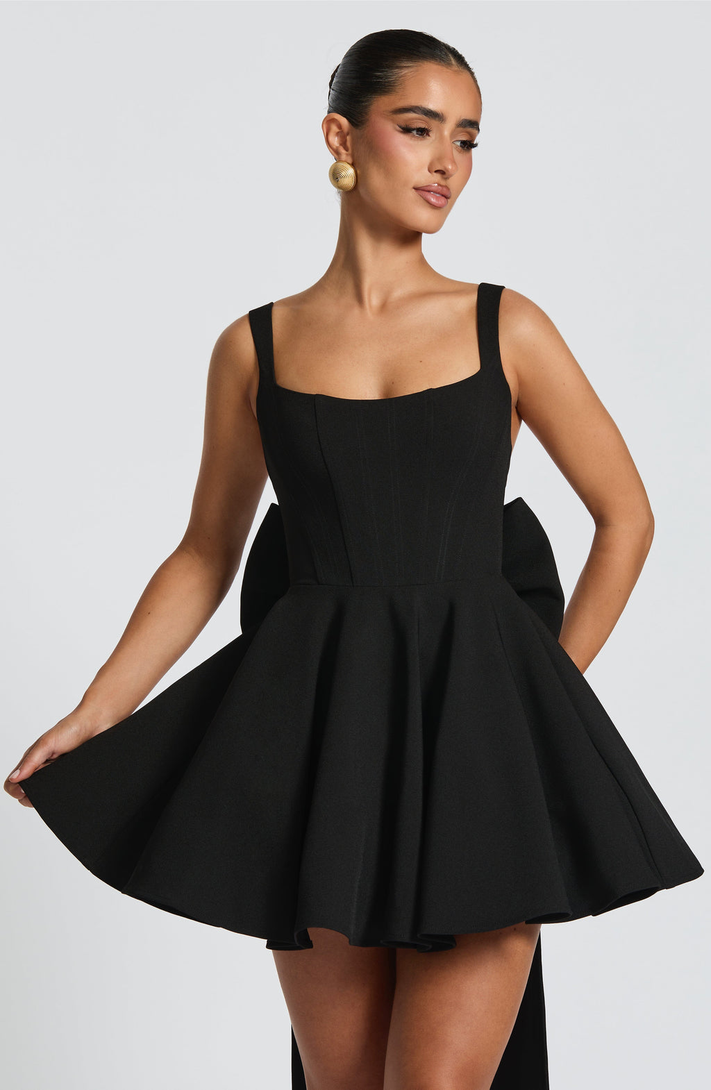 Kristin Back Bow Embellished Mini Dress in Black Avalabel