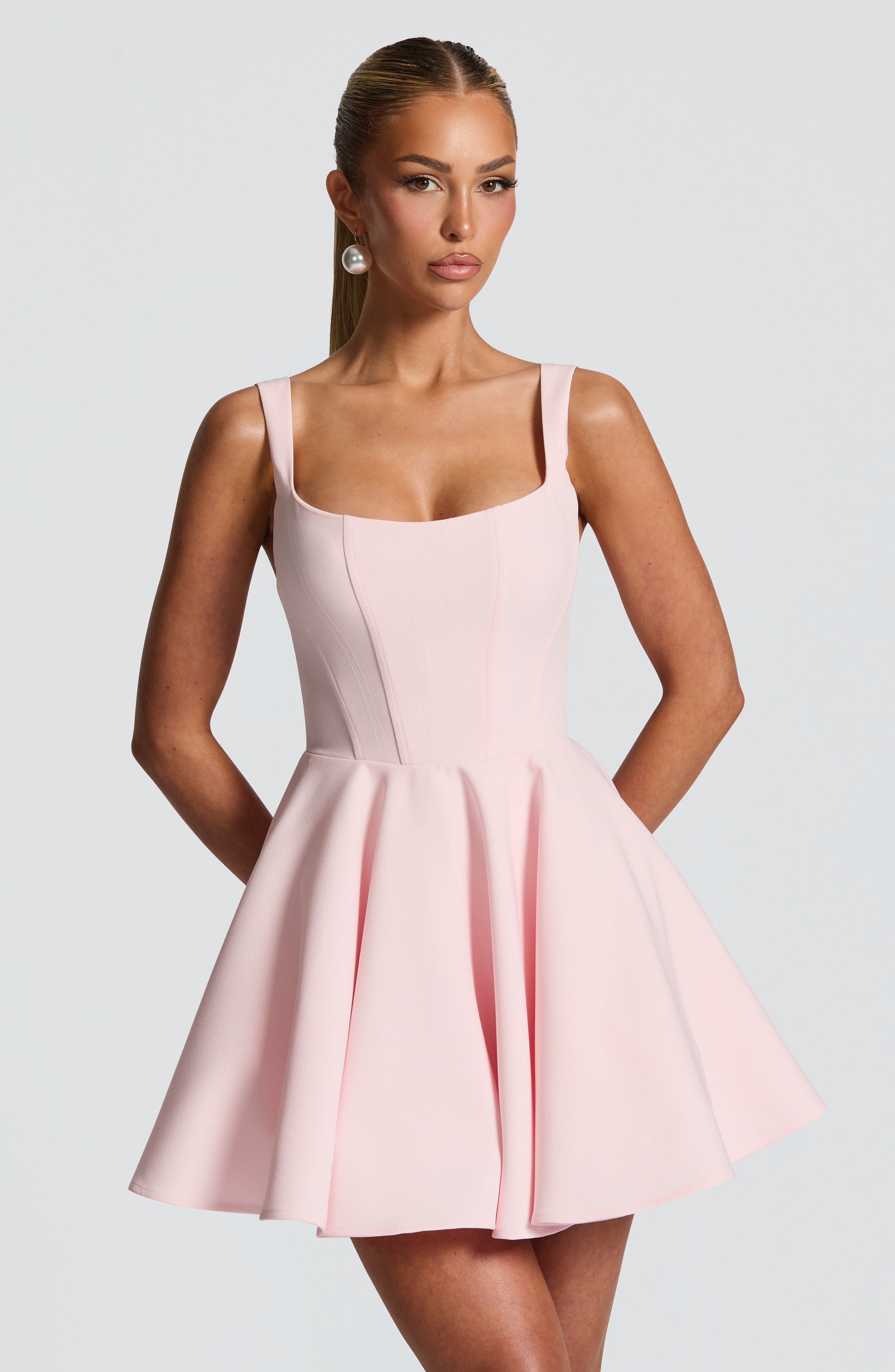Kristin Back Bow Embellished Mini Dress in Blush Avalabel